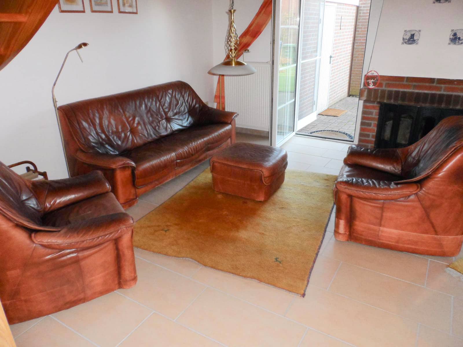 Ferienhaus Lederaufbereitung - Ledercouch in braun vorher